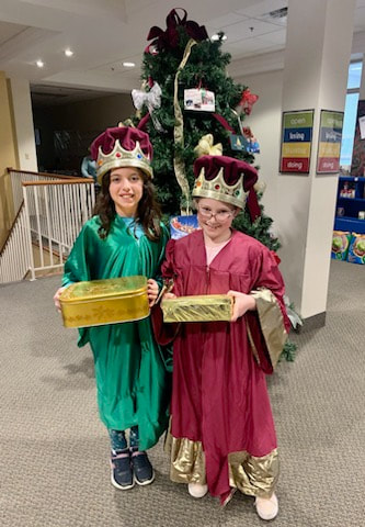 two children in a church Christmas pageant